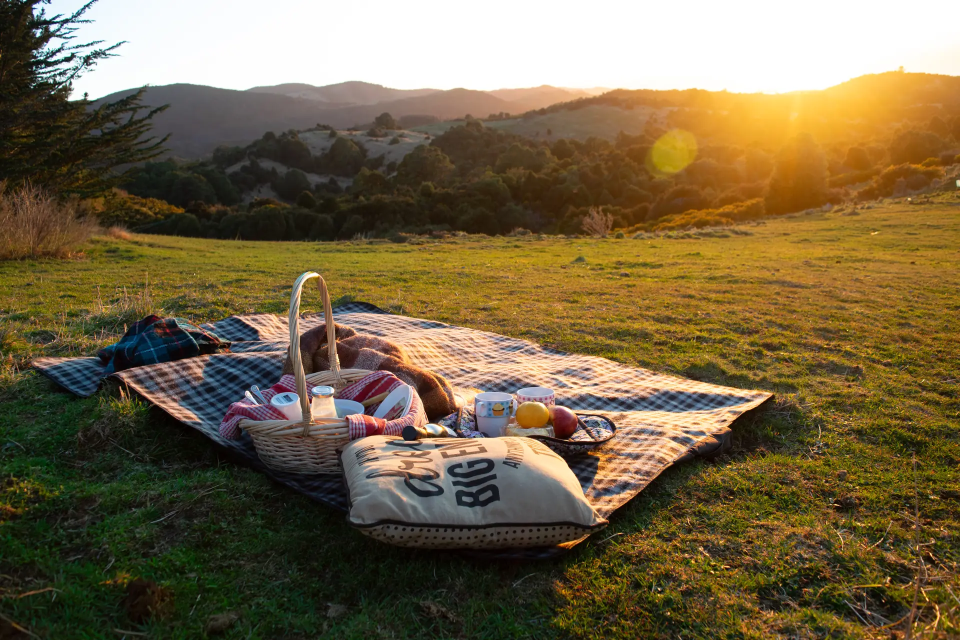 The breakfast hamper on the hill at sunrise